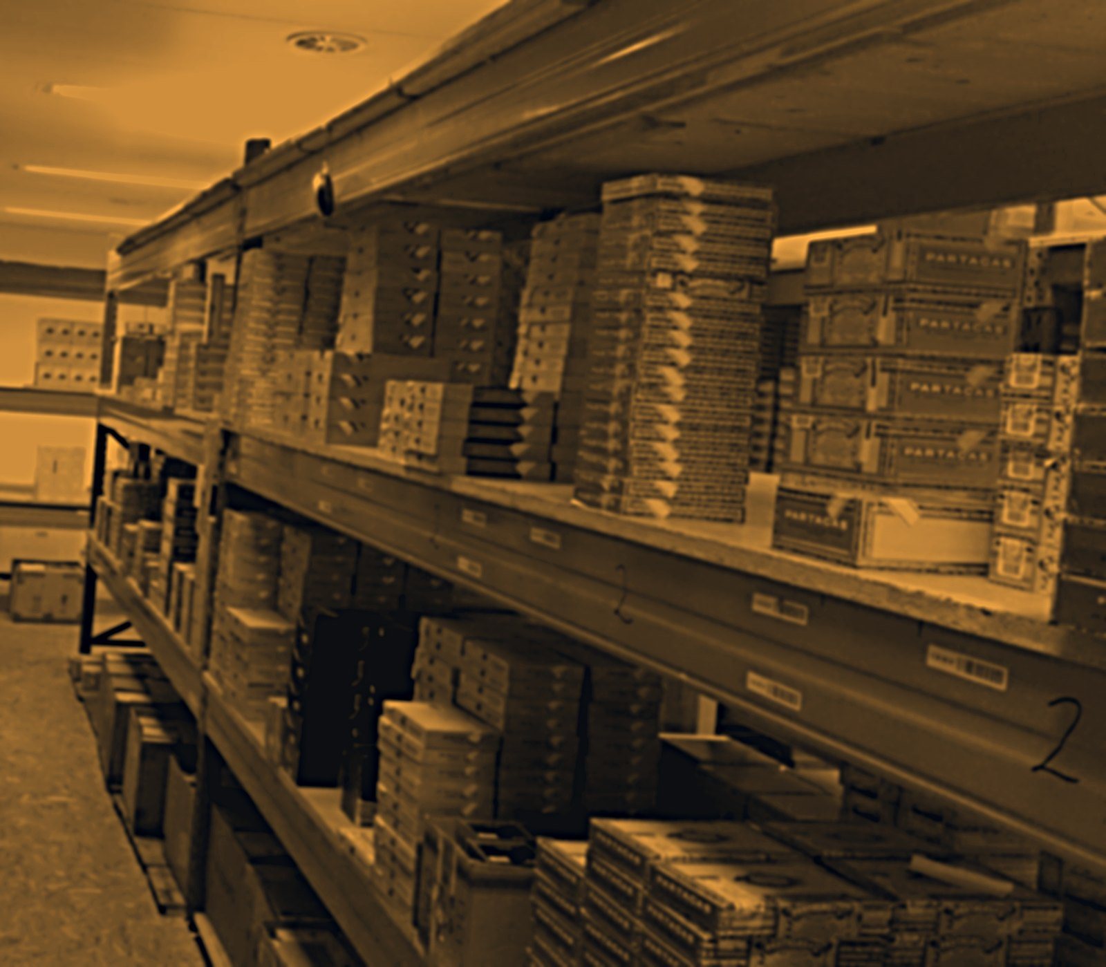 Racked premium cigar stock inside the Swiss bonded warehouse